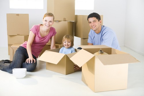 Removal team loading furniture for a planned house move