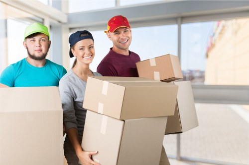 Careful furniture handling on stairs during relocation