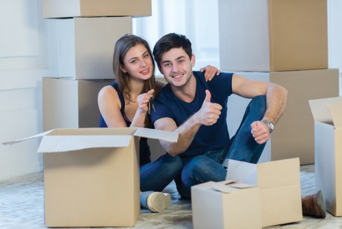 Professional movers coordinating a Swisscottage business relocation