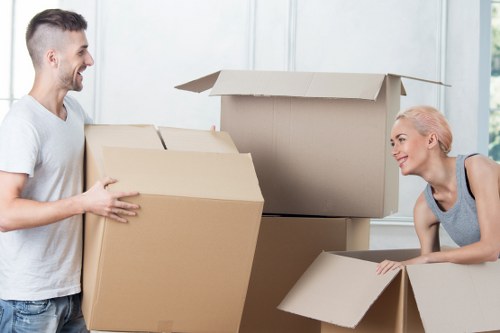 Room-by-room packing setup for house removals in Swisscottage