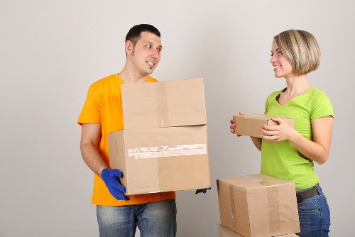 Professional mover assisting with a Swisscottage home move
